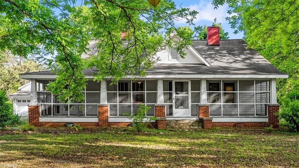 Photo of 1212 Ritters Lake Road, Greensboro, NC 27406 (MLS # 1220277)