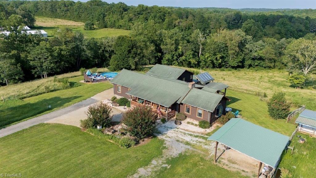 Photo of 300 Tom Hunter Road, Pilot Mountain, NC 27041 (MLS # 1229788)