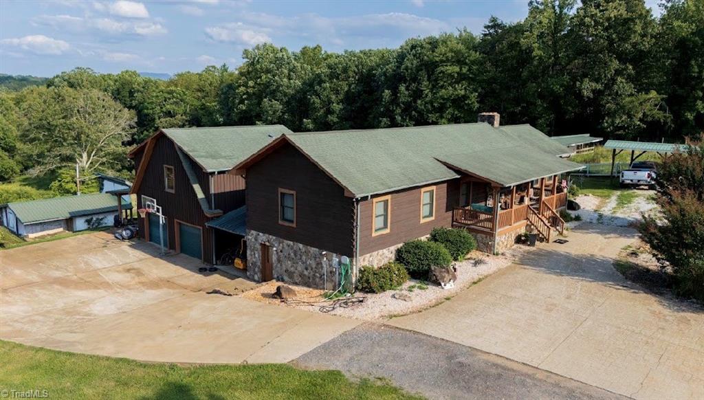 Photo of 300 Tom Hunter Road, Pilot Mountain, NC 27041 (MLS # 1229788)