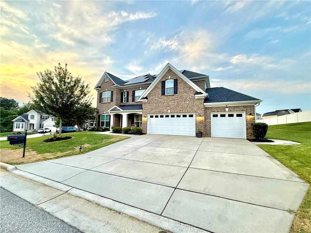 Photo of 6605 Jockey Club Drive, Whitsett, NC 27377 (MLS # 1233510)