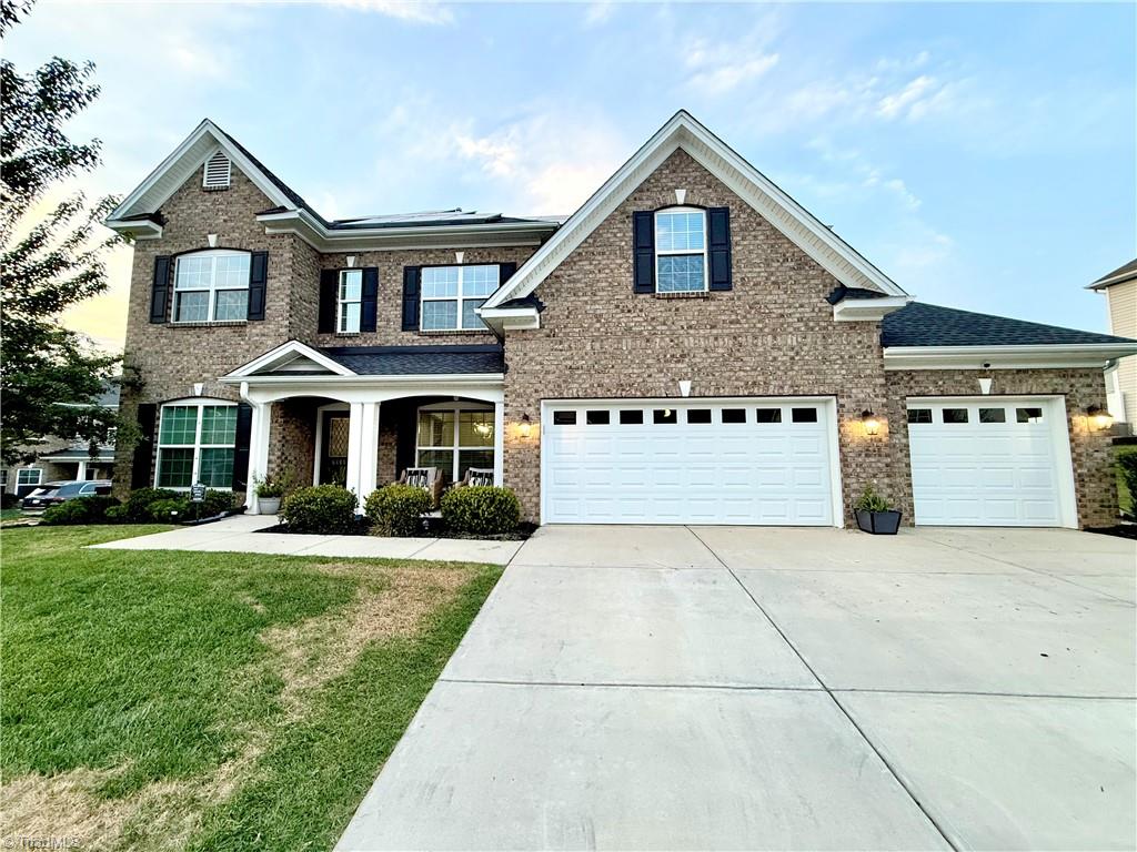Photo of 6605 Jockey Club Drive, Whitsett, NC 27377 (MLS # 1233510)