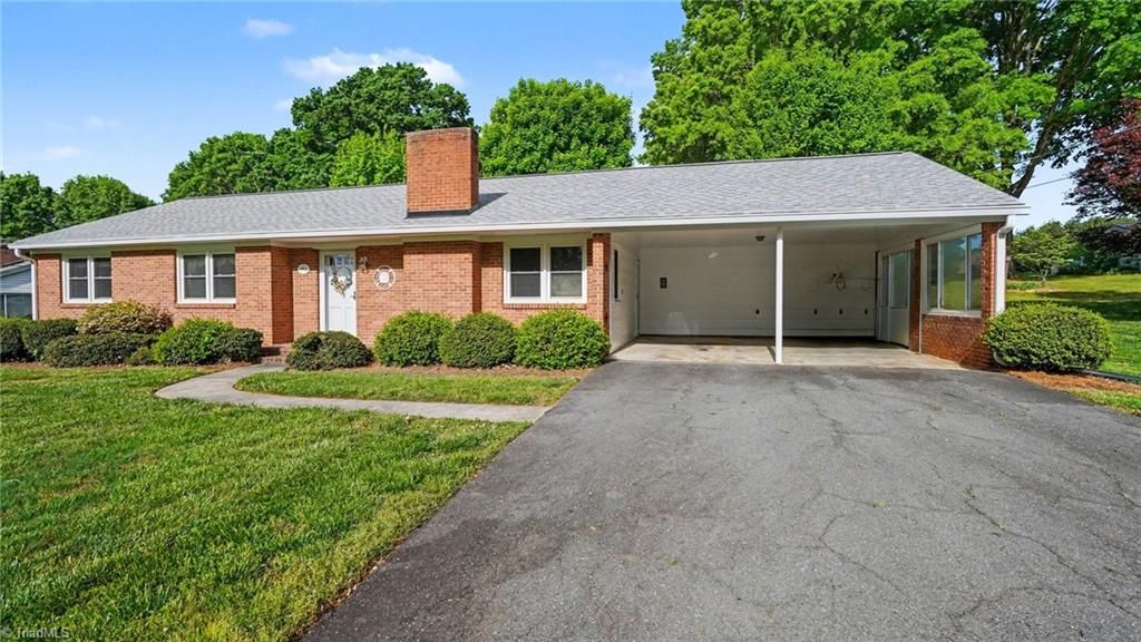 Photo of 140 Sims Drive, Lewisville, NC 27023 (MLS # 1216679)