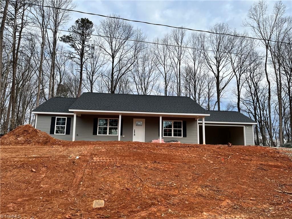 Photo of 4185 Watts Street, Tobaccoville, NC 27050 (MLS # 1207910)