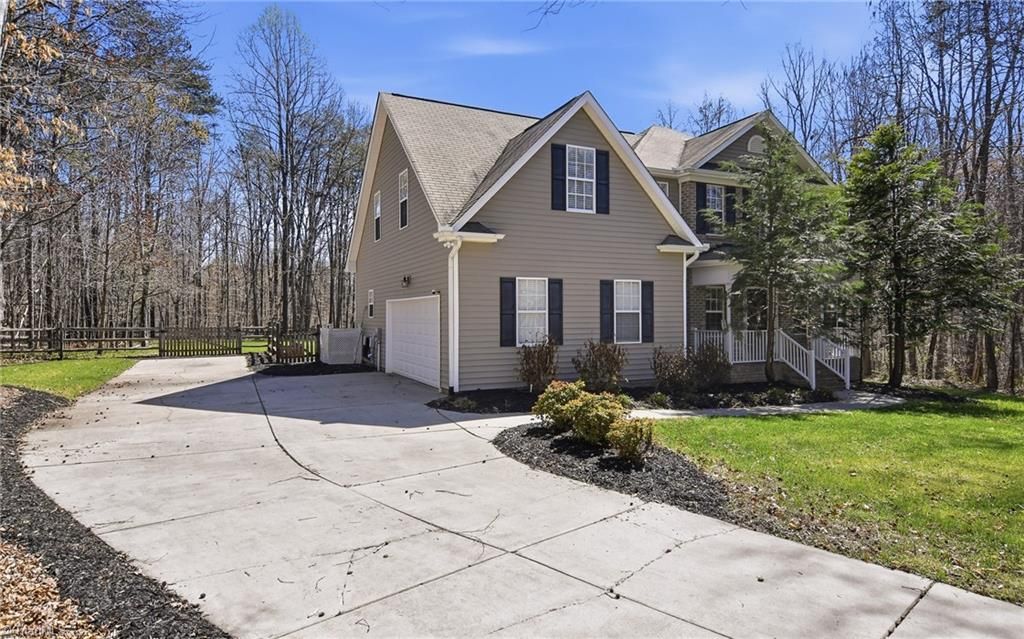 Photo of 8090 Meadow Springs Place, Stokesdale, NC 27357 (MLS # 1212811)