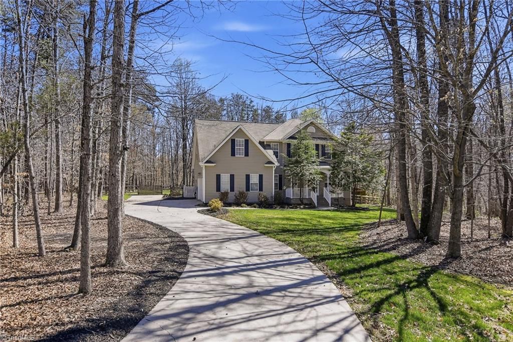 Photo of 8090 Meadow Springs Place, Stokesdale, NC 27357 (MLS # 1212811)