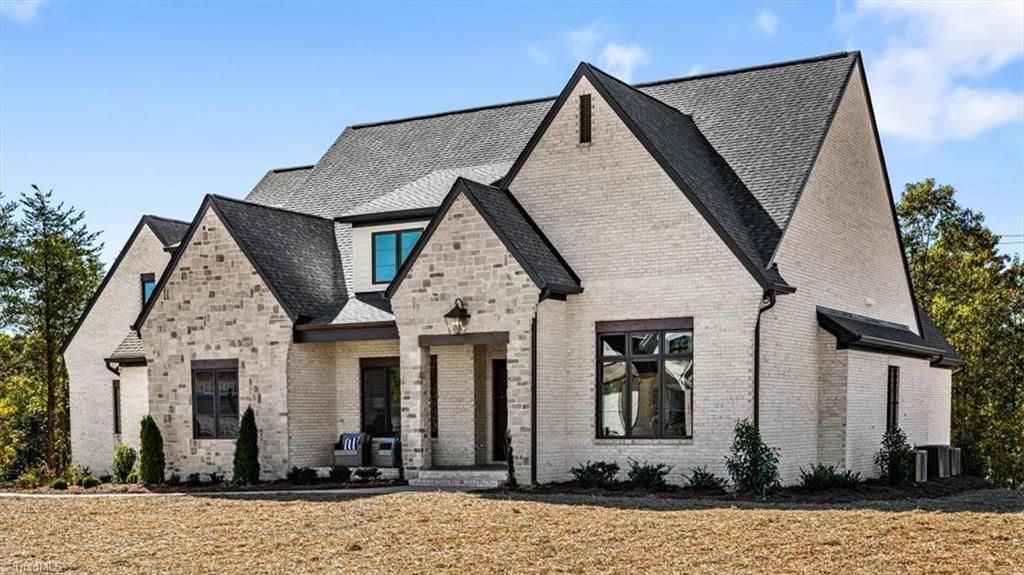 Photo of 7539 Shadow Creek Drive, Summerfield, NC 27358 (MLS # 1197797)