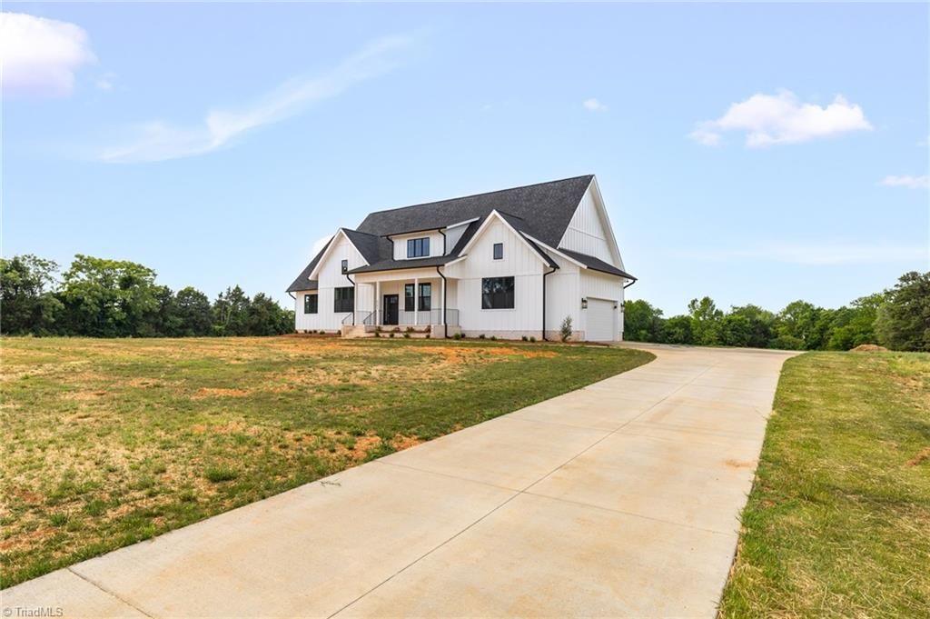 Photo of 6205 Phillippi Road, Julian, NC 27233 (MLS # 1218379)