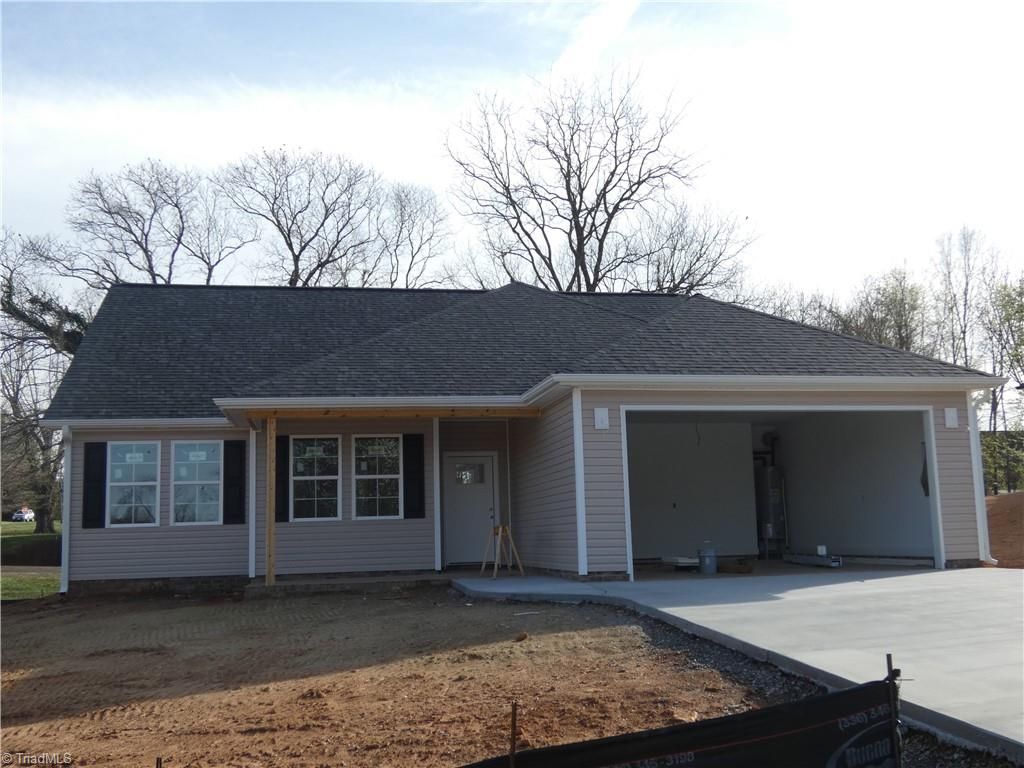 Photo of 105 Hickory Street, Yadkinville, NC 27055 (MLS # 1212629)