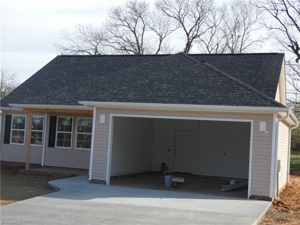 Photo of 105 Hickory Street, Yadkinville, NC 27055 (MLS # 1212629)