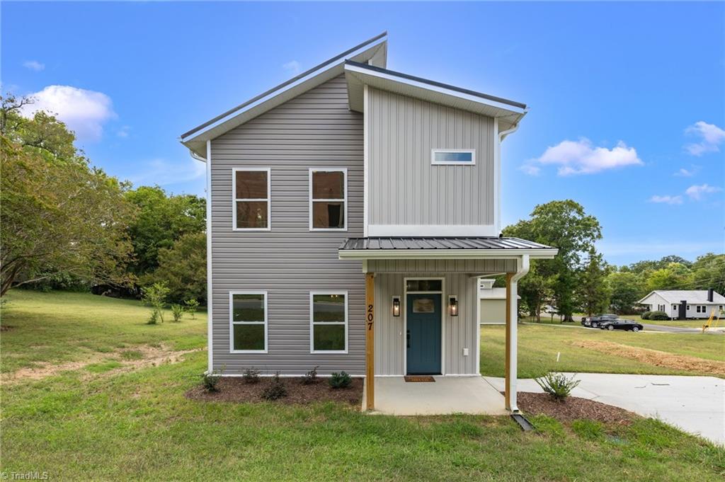 Photo of 207 E Parker Street, Graham, NC 27253 (MLS # 1237619)