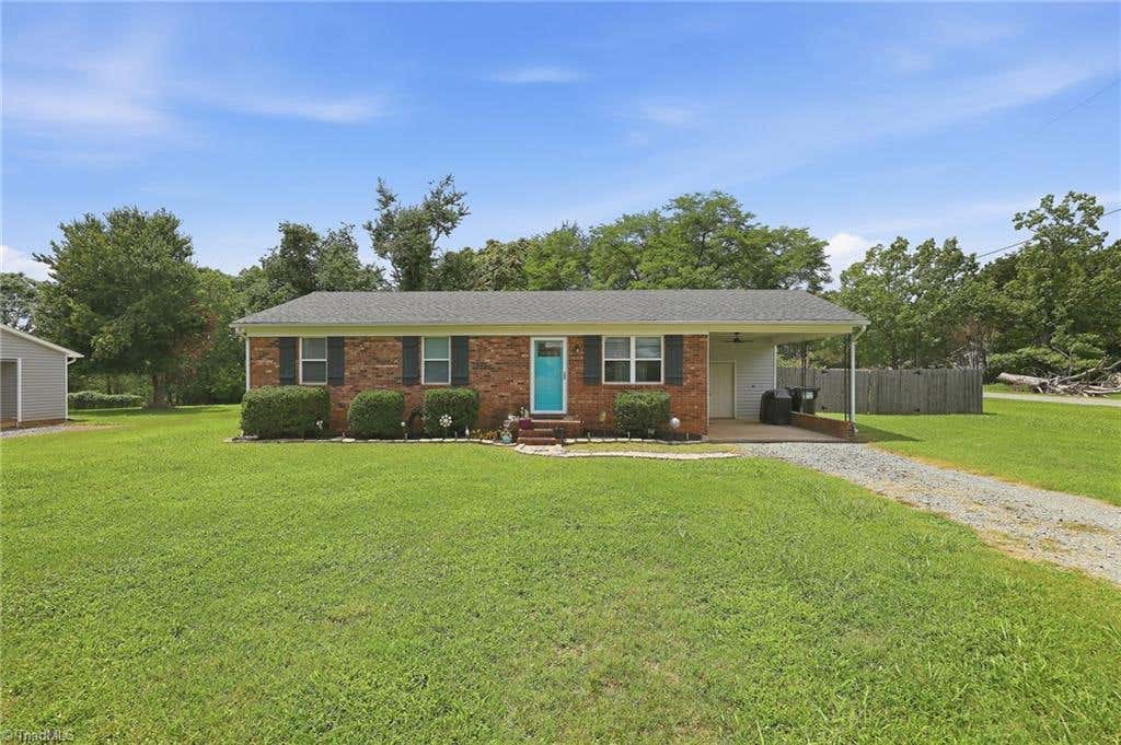 Photo of 7390 Plunkett Road, Belews Creek, NC 27009 (MLS # 1229962)
