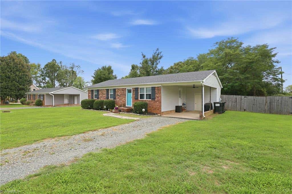 Photo of 7390 Plunkett Road, Belews Creek, NC 27009 (MLS # 1229962)