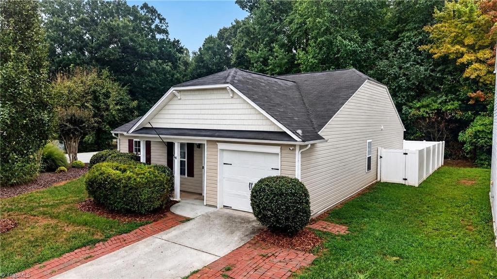 Photo of 3034 Desmond Woods Drive, Greensboro, NC 27405 (MLS # 1235834)