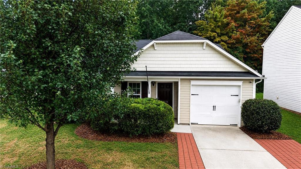 Photo of 3034 Desmond Woods Drive, Greensboro, NC 27405 (MLS # 1235834)