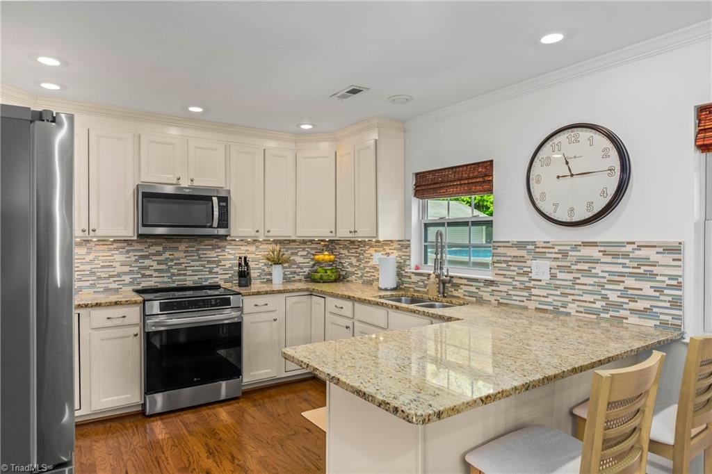 Photo of 1004 Timberpeg Court, Lewisville, NC 27023 (MLS # 1230178)