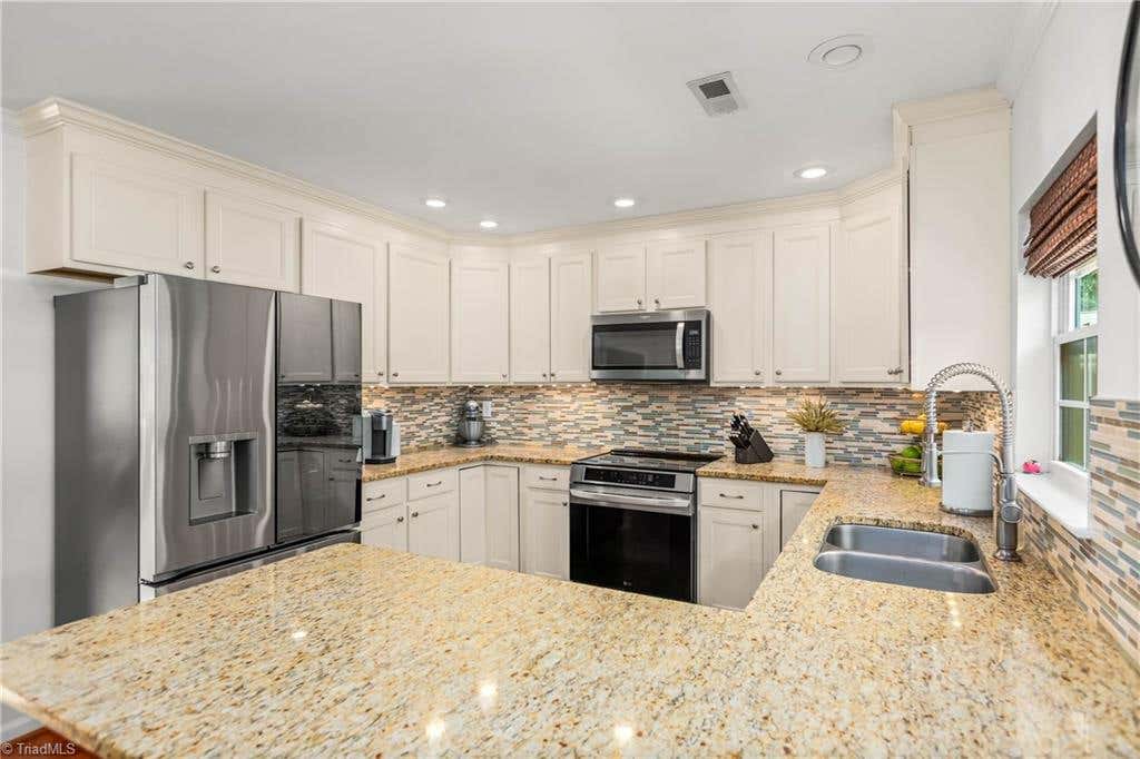 Photo of 1004 Timberpeg Court, Lewisville, NC 27023 (MLS # 1230178)