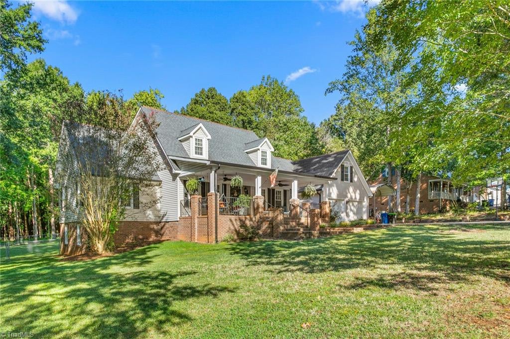 Photo of 308 Woodland Drive, Elon, NC 27244 (MLS # 1237089)