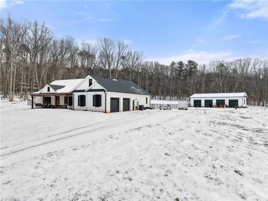 Photo of 7994 Ridge Road, Tobaccoville, NC 27050 (MLS # 1208396)