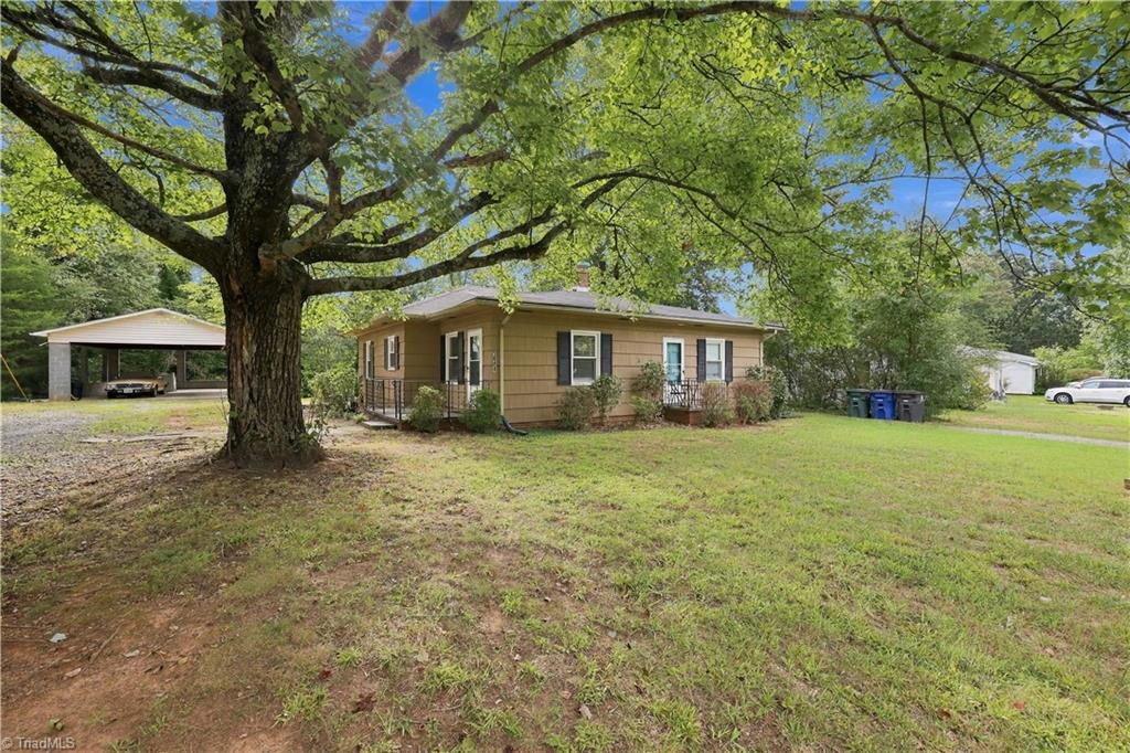 Photo of 5038 Pinewood Drive, Winston-Salem, NC 27106 (MLS # 1235862)