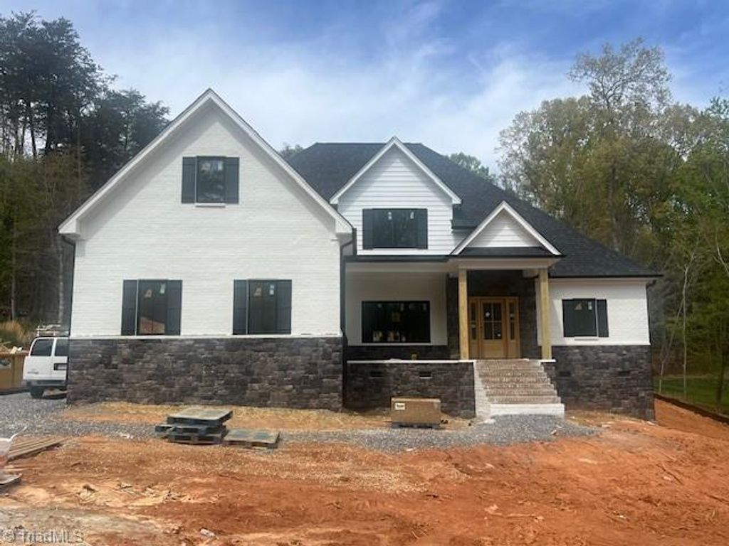 Photo of 7640 Crossing Ridge Drive, Belews Creek, NC 27009 (MLS # 1215054)