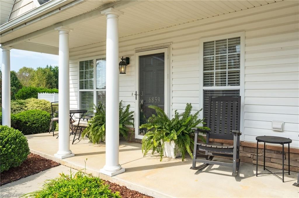 Photo of 6859 Derby Run Drive, Whitsett, NC 27377 (MLS # 1203895)