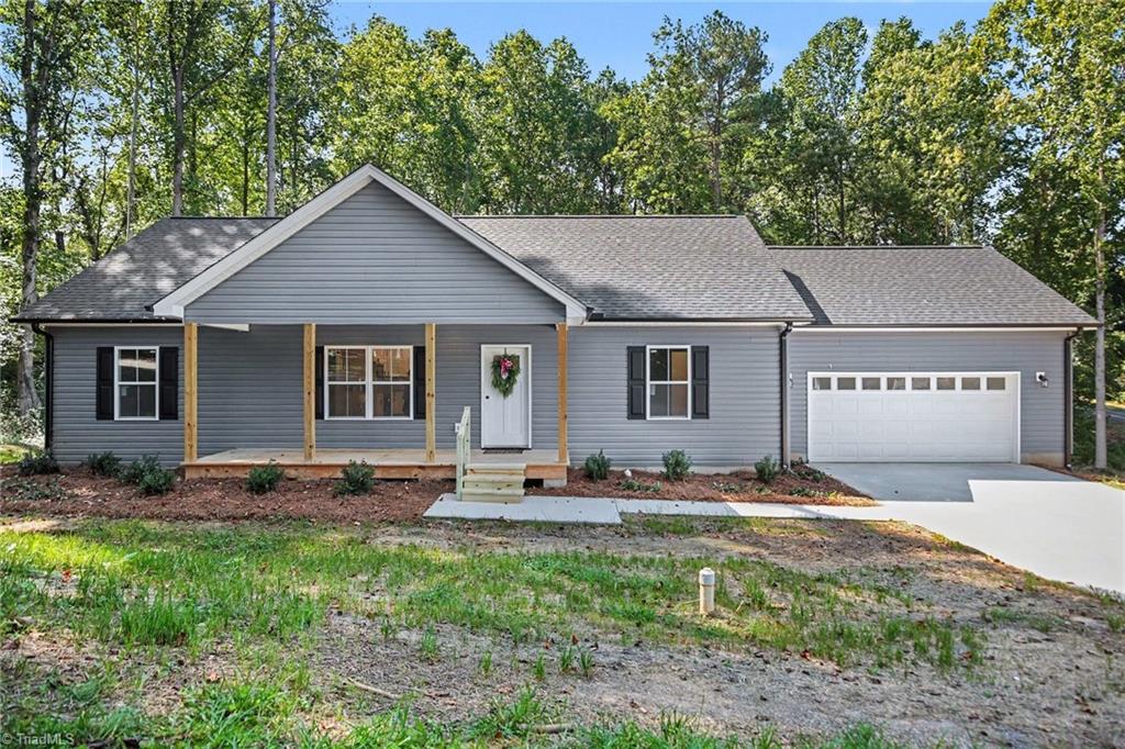 Photo of 406 Grant Street, Yadkinville, NC 27055 (MLS # 1236228)