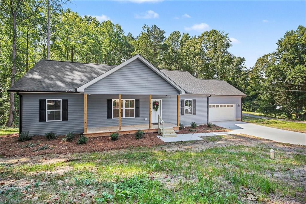 Photo of 406 Grant Street, Yadkinville, NC 27055 (MLS # 1236228)