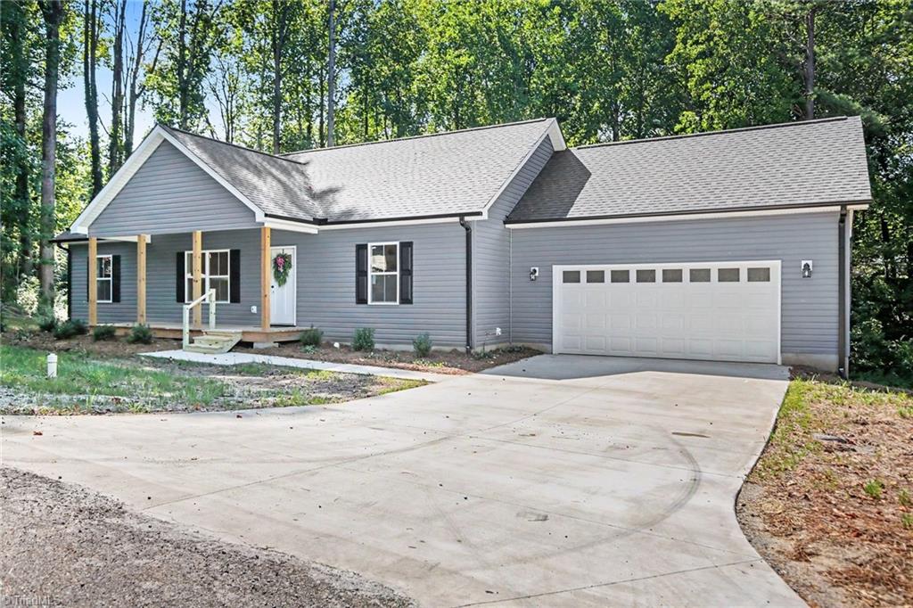 Photo of 406 Grant Street, Yadkinville, NC 27055 (MLS # 1236228)