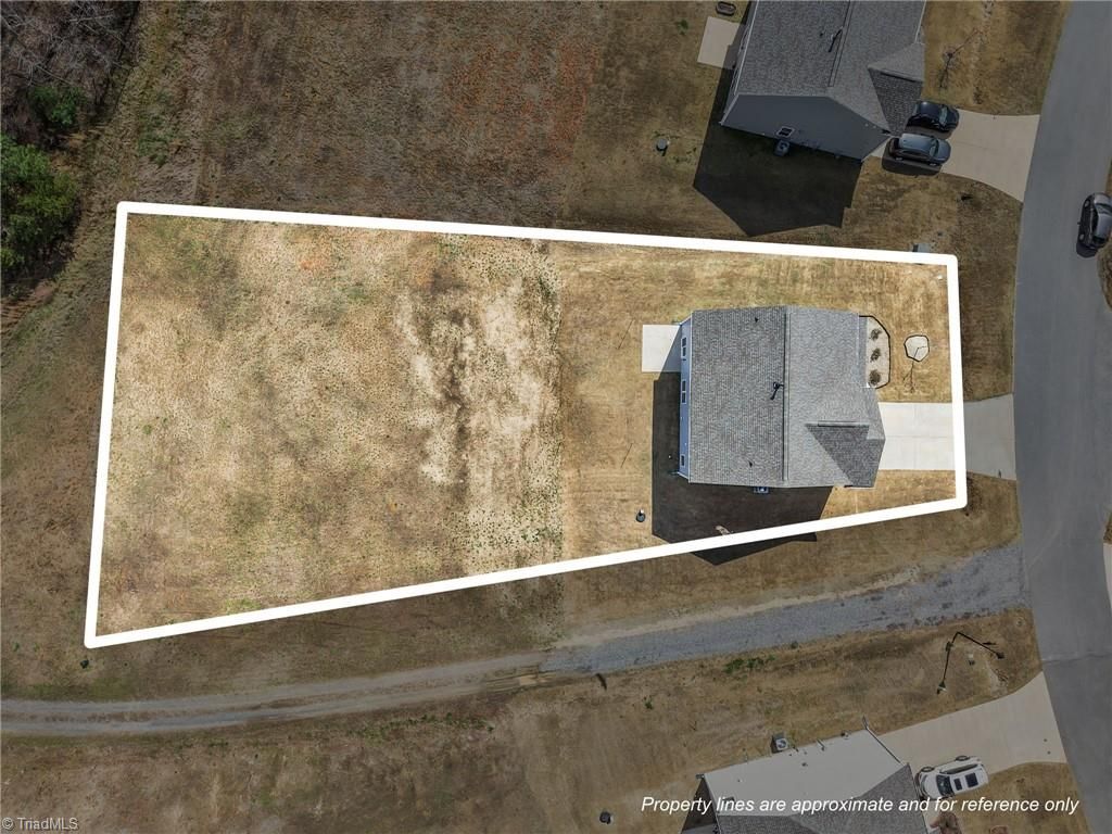 Photo of 7448 Buckpasser Drive, Greensboro, NC 27455 (MLS # 1212474)