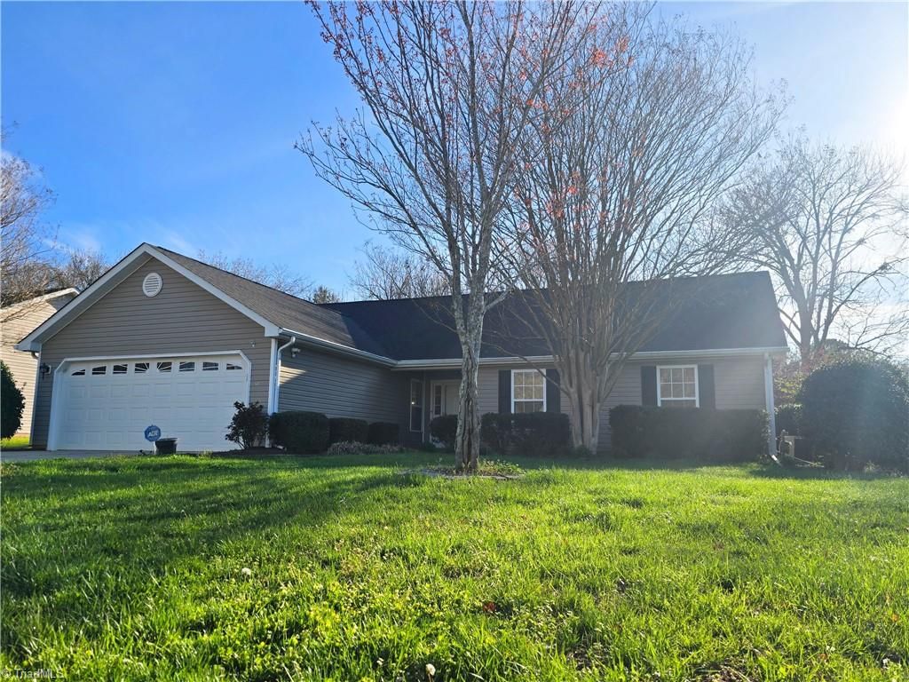 Photo of 517 Walnut Crossing Drive, Whitsett, NC 27377 (MLS # 1212754)