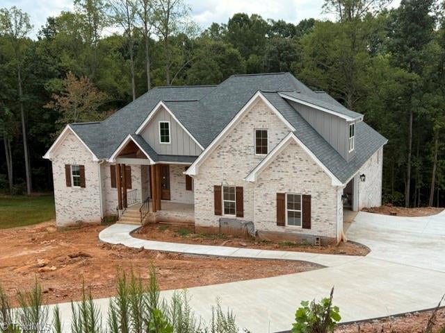 Photo of 8205 Lulworth Drive, Stokesdale, NC 27357 (MLS # 1208275)