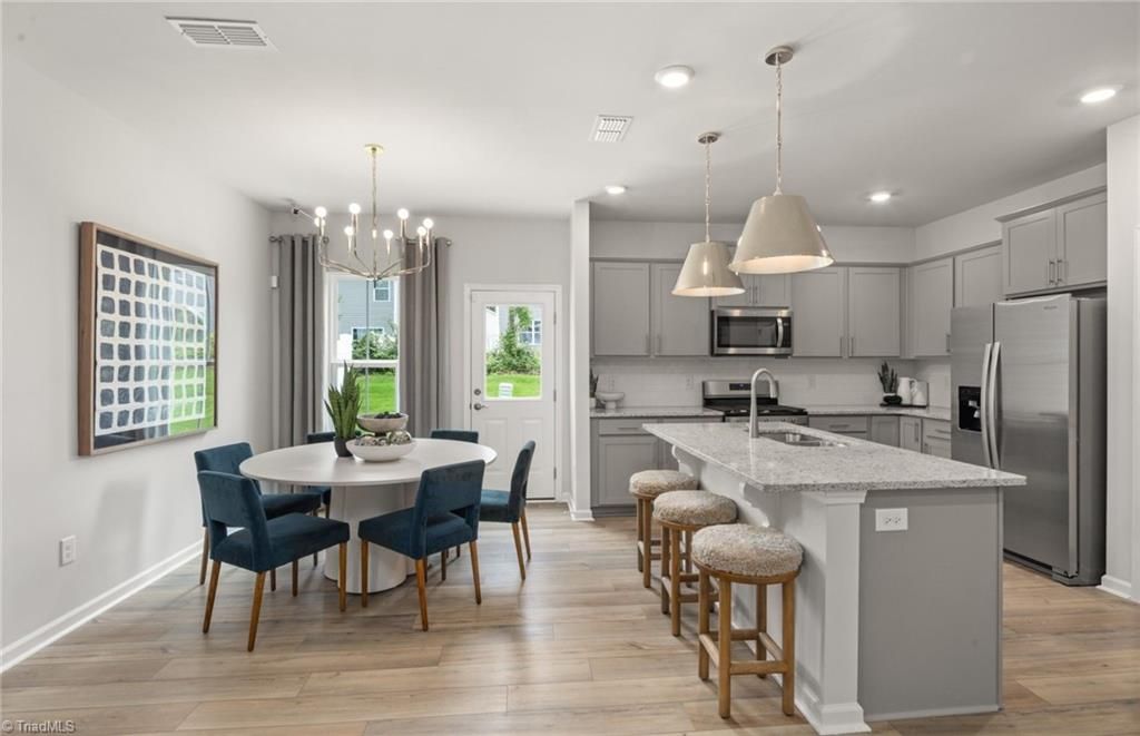 Photo of 1618 Eckert Lane, Whitsett, NC 27377 (MLS # 1222057)