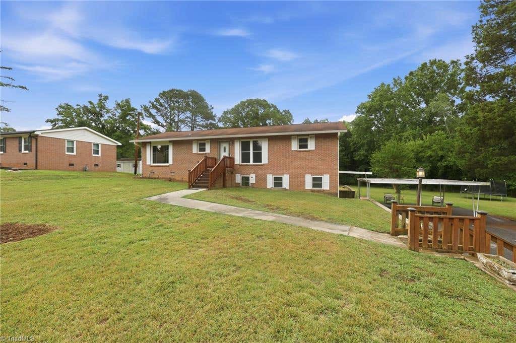 Photo of 401 Grant Street, East Spencer, NC 28027 (MLS # 1225513)