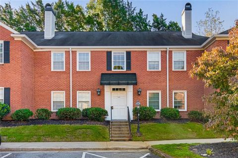 Photo of 380 Hanover Arms Court #C, Winston-Salem, NC 27104 (MLS # 1207338)