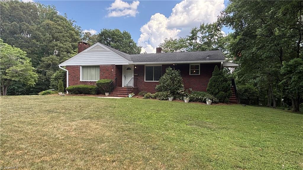 Photo of 1061 N Peace Haven Road, Winston-Salem, NC 27104 (MLS # 1224078)
