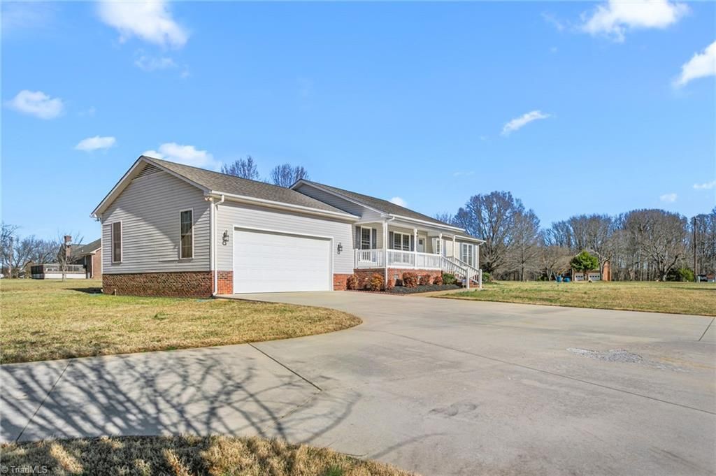 Photo of 7021 Eaglesfield Road, Gibsonville, NC 27249 (MLS # 1207083)