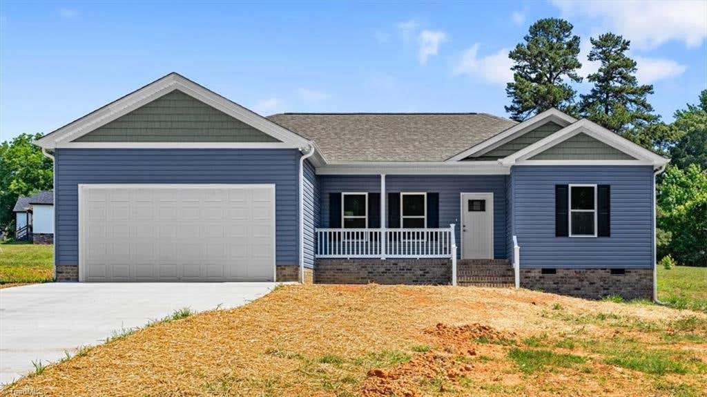 Photo of 421 E Raleigh Avenue, Liberty, NC 27298 (MLS # 1223999)