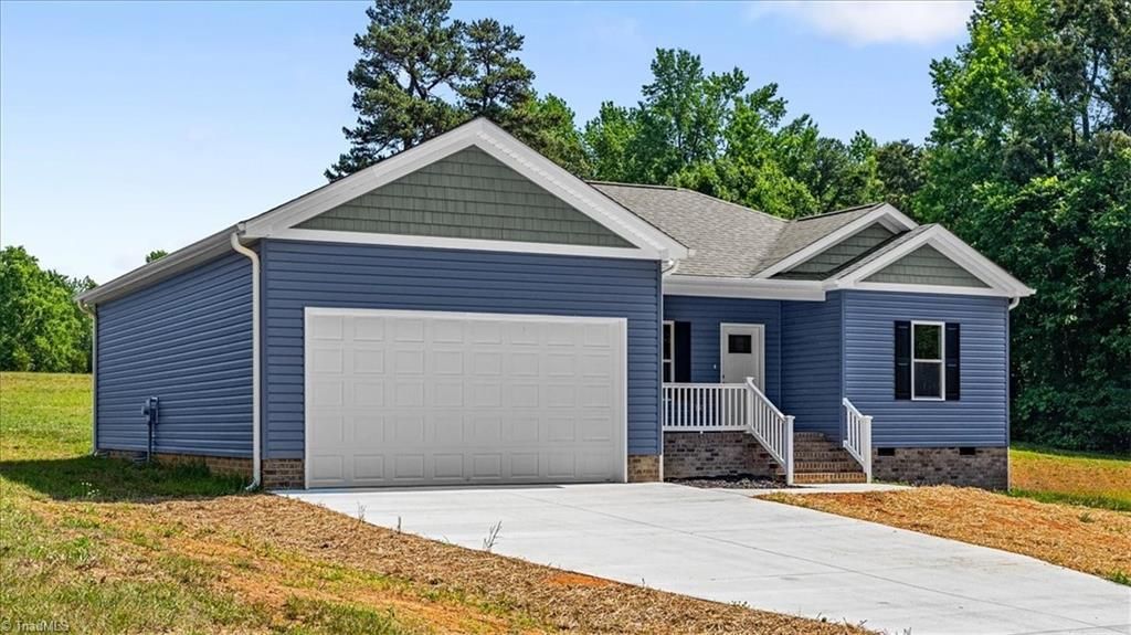 Photo of 421 E Raleigh Avenue, Liberty, NC 27298 (MLS # 1223999)