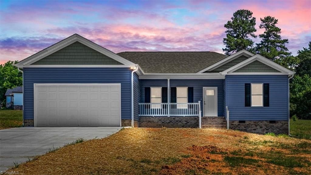 Photo of 421 E Raleigh Avenue, Liberty, NC 27298 (MLS # 1223999)