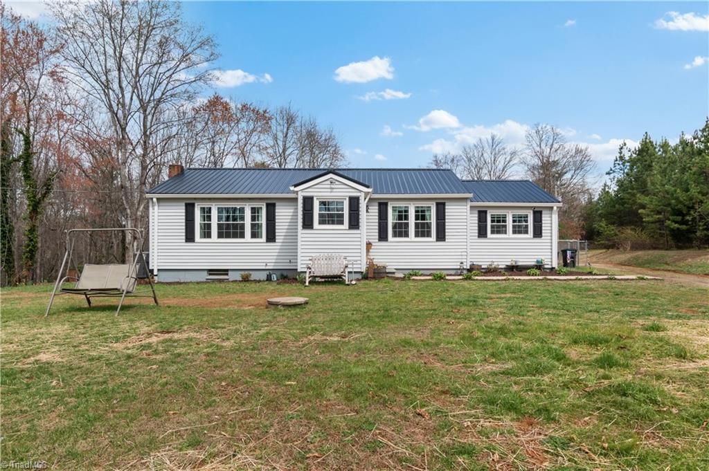 Photo of 379 Pat Nixon Road, State Road, NC 28676 (MLS # 1213035)