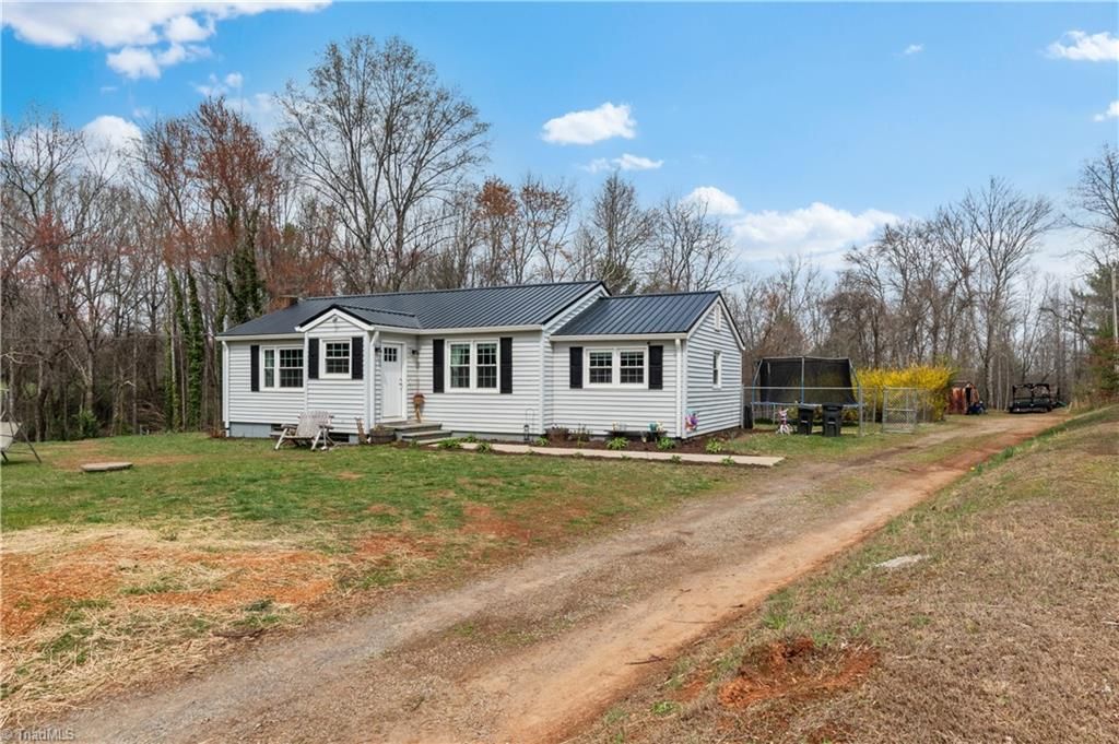 Photo of 379 Pat Nixon Road, State Road, NC 28676 (MLS # 1213035)
