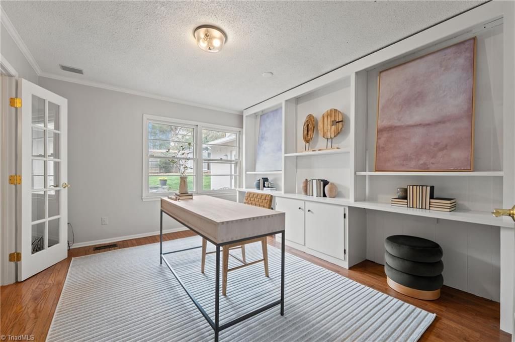 Photo of 2009 Downing Street, Greensboro, NC 27410 (MLS # 1204853)