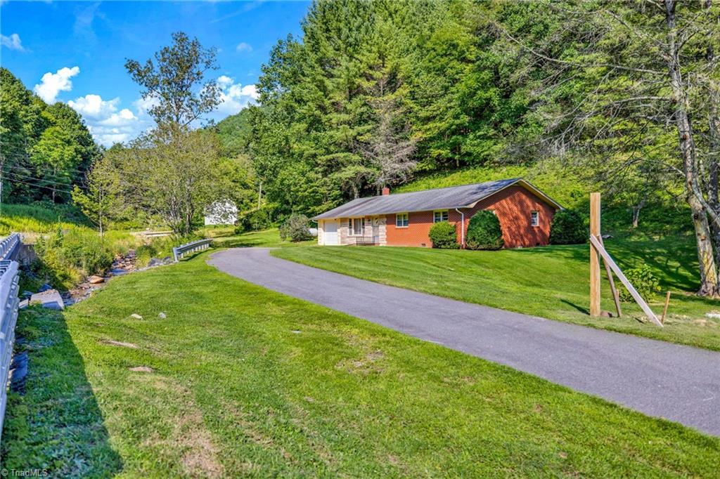 Photo of 480 Roaring Fork Road, Creston, NC 28615 (MLS # 1234766)