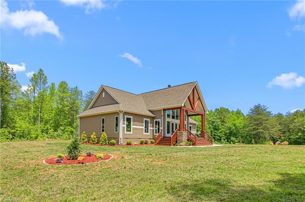 Photo of 625 Robertson Road, McLeansville, NC 27301 (MLS # 1218729)