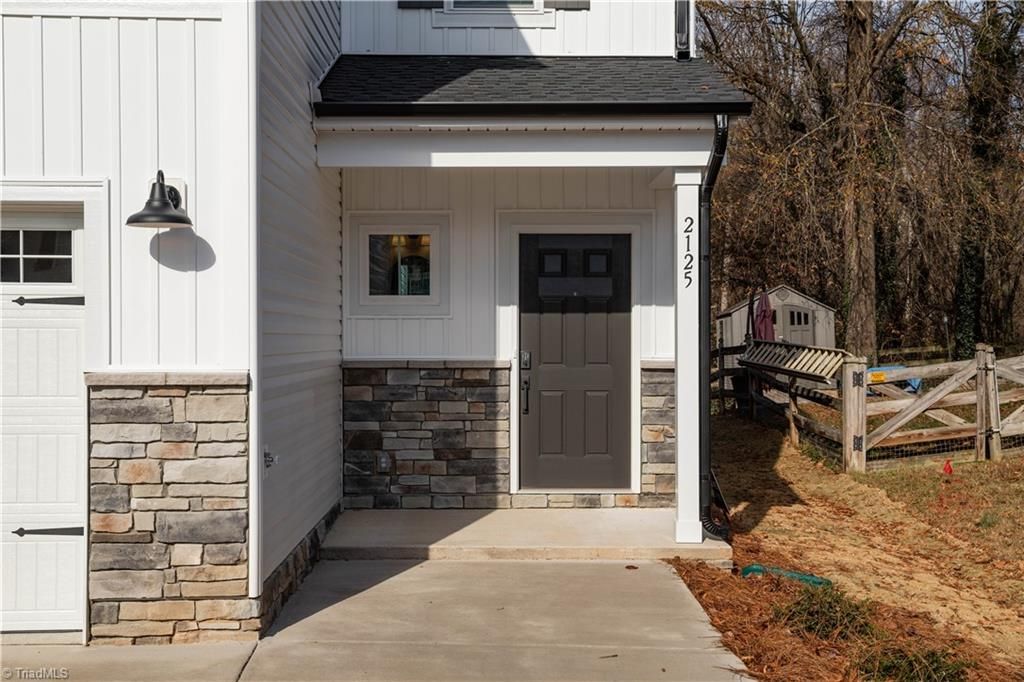 Photo of 2125 Hogan Point Drive #1018, Winston-Salem, NC 27127 (MLS # 1203891)