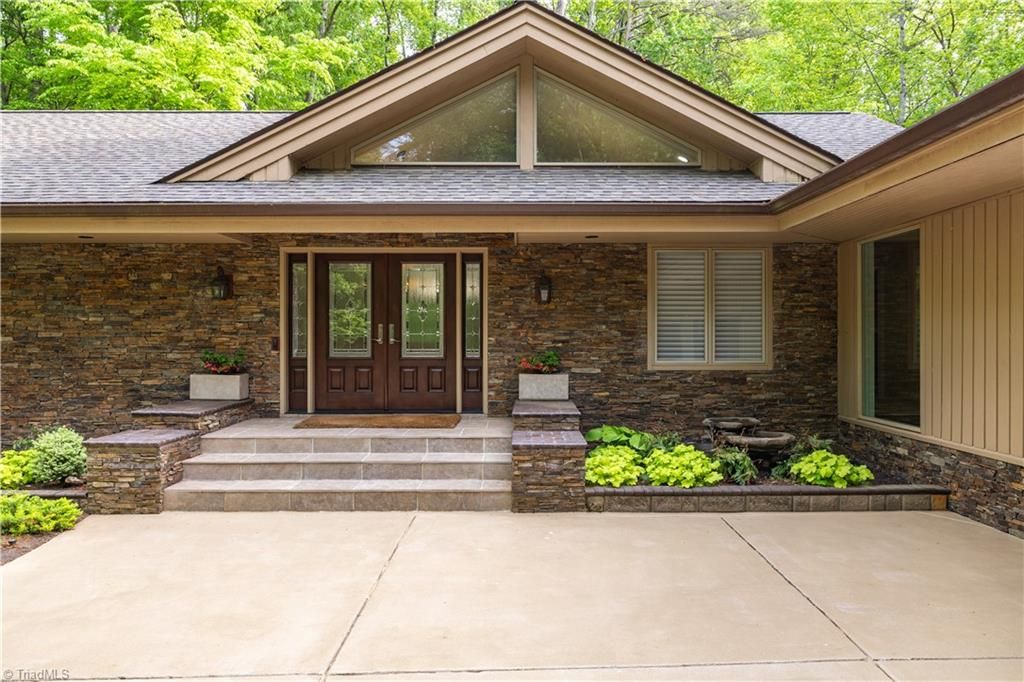 Photo of 501 W Poplar Ridge Court, Greensboro, NC 27455 (MLS # 1216367)