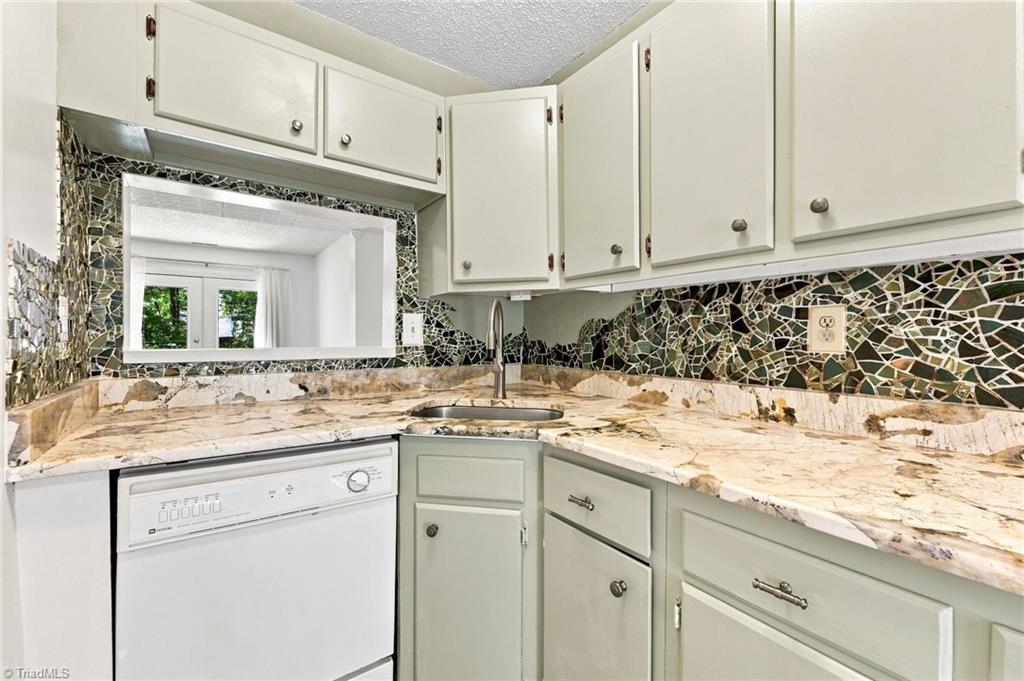 Photo of 301 Village Lane #F, Greensboro, NC 27409 (MLS # 1236751)