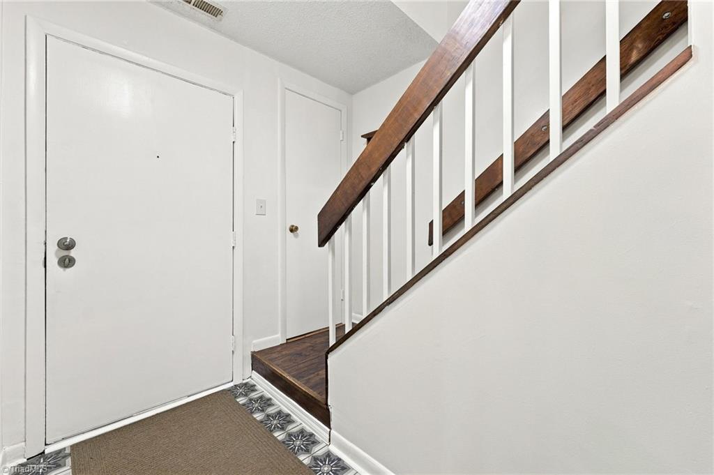 Photo of 301 Village Lane #F, Greensboro, NC 27409 (MLS # 1236751)