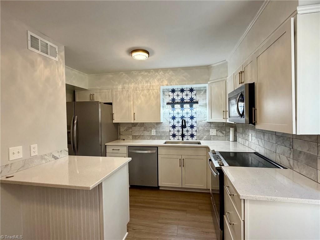 Photo of 2315 Bay Meadows Court #F, Winston-Salem, NC 27103 (MLS # 1207293)