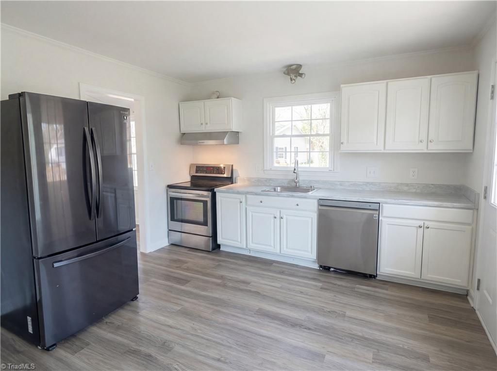 Photo of 1495 Peace Haven Road, Clemmons, NC 27012 (MLS # 1213985)